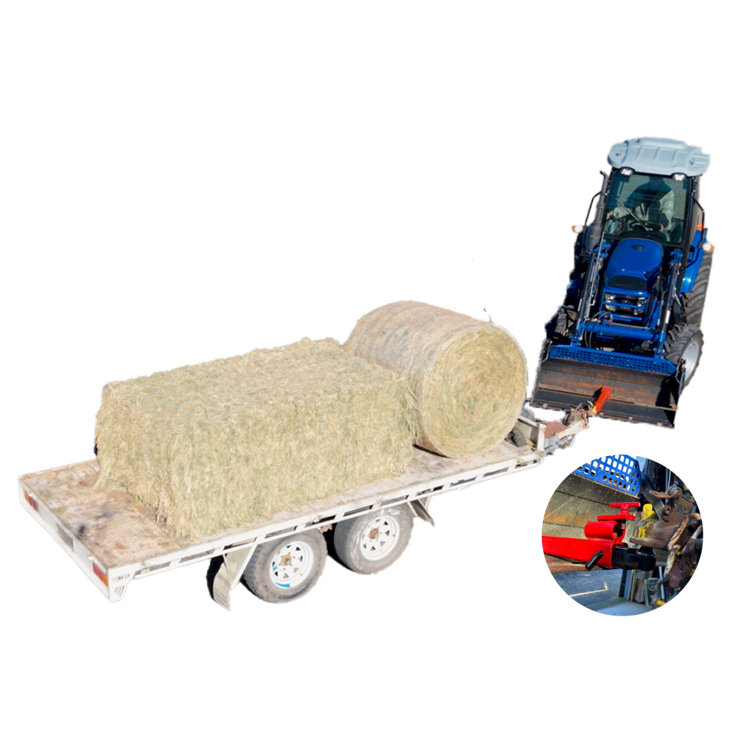 BucketMate in a 4-in-1 bucket with tow hitch attached, towing a trailer loaded with hay