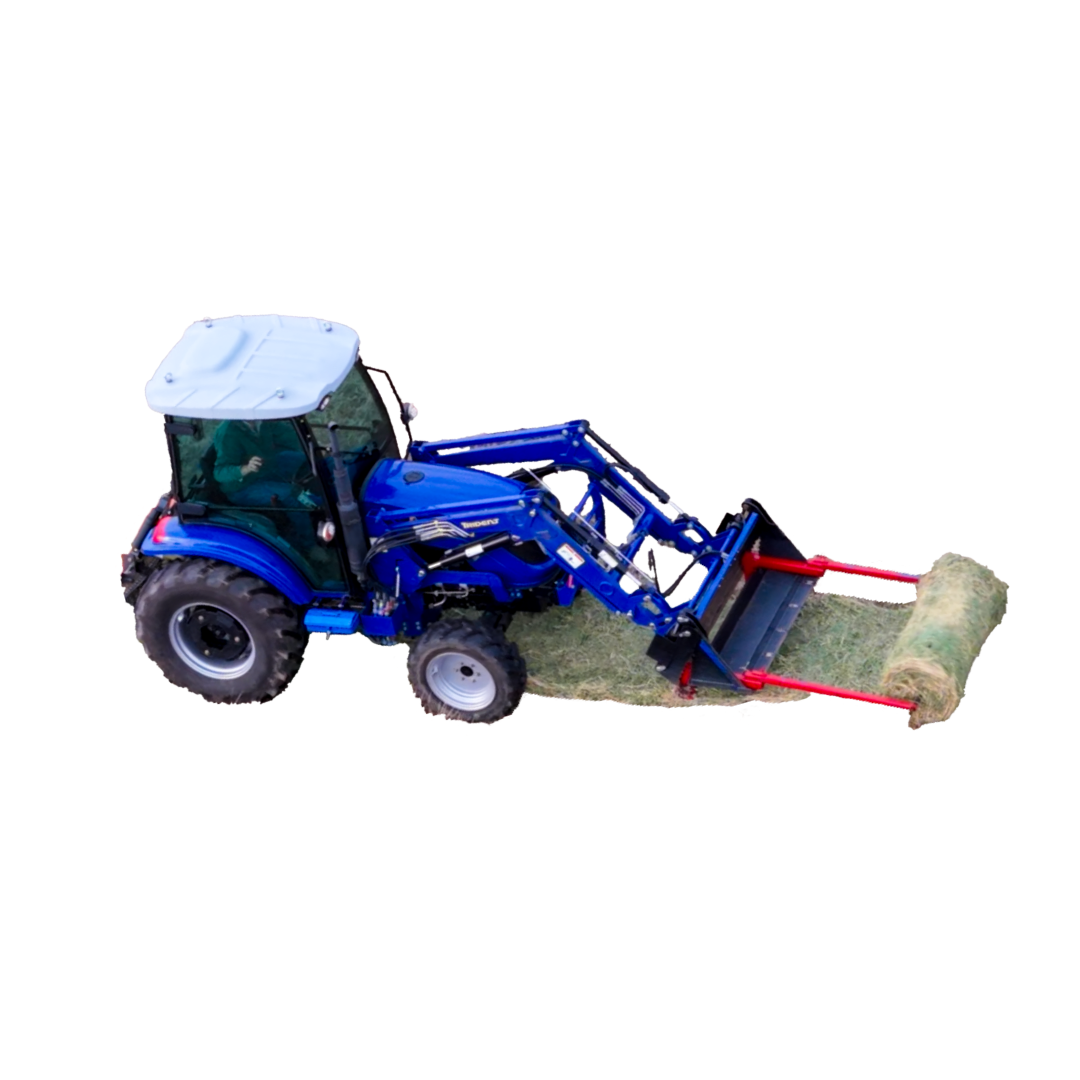 BucketMate in a 4-in-1 bucket with pallet forks attached, feeding out hay bale